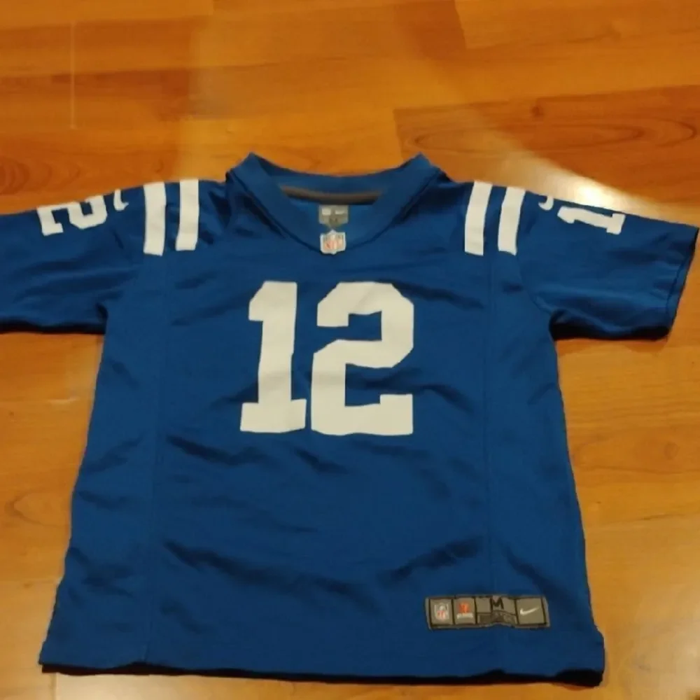 Nike Blue and White Sports Colt Jersey #12 Luck
